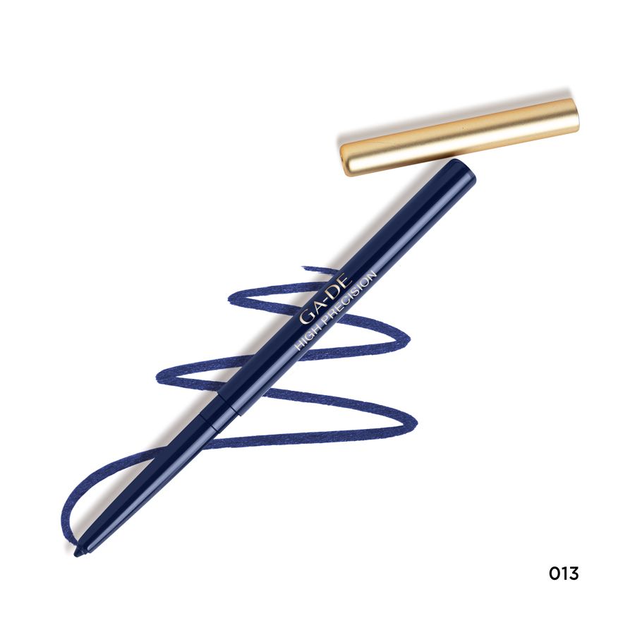 Eyeliner bleu avec capuchon doré ouvert. Inscription: GA-DE HIGH PRECISION. Trait bleu.