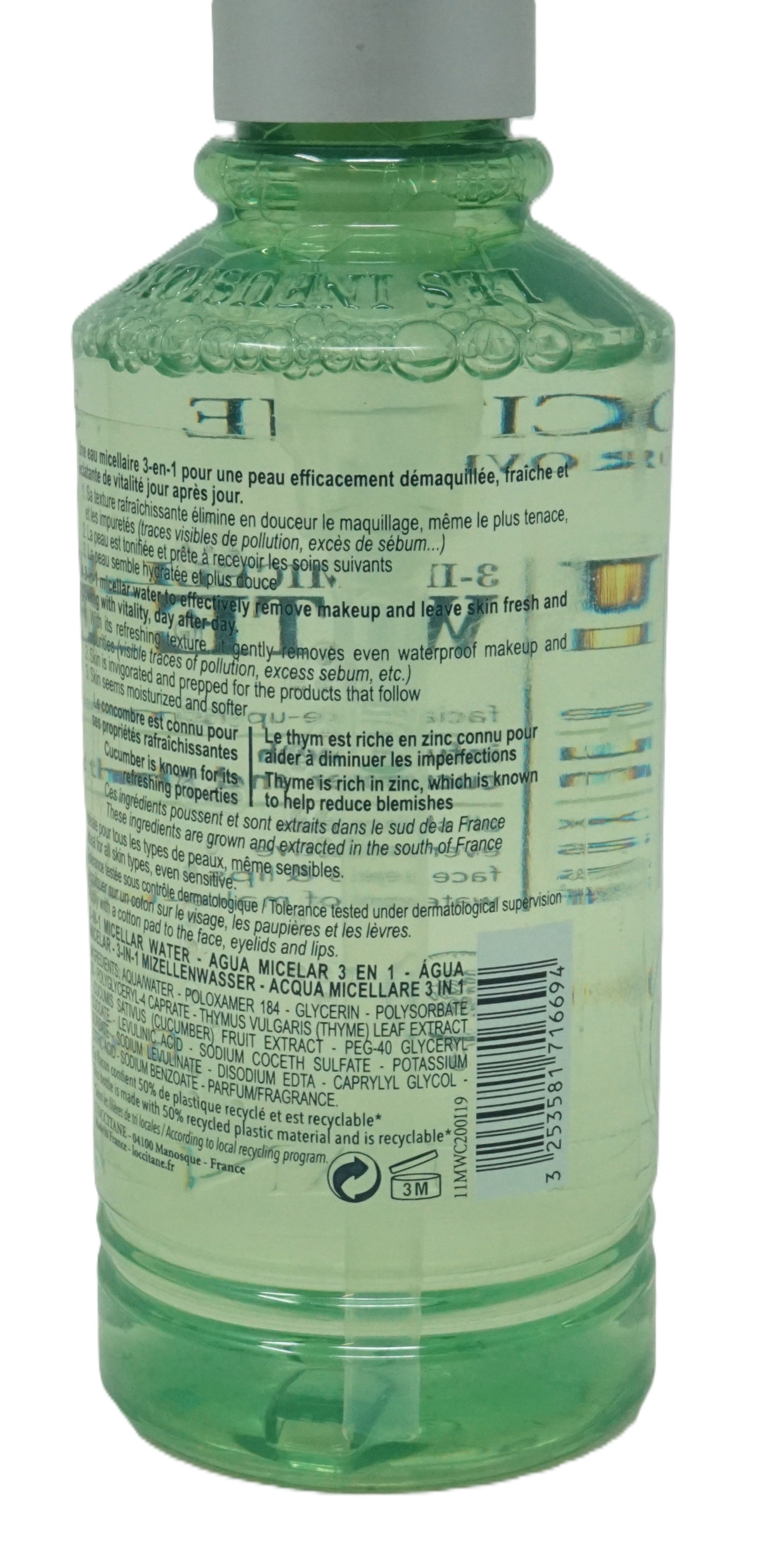 Bouteille verte avec texte d'étiquette. Nom du produit non visible. Dos avec ingrédients et informations. Liquide transparent.