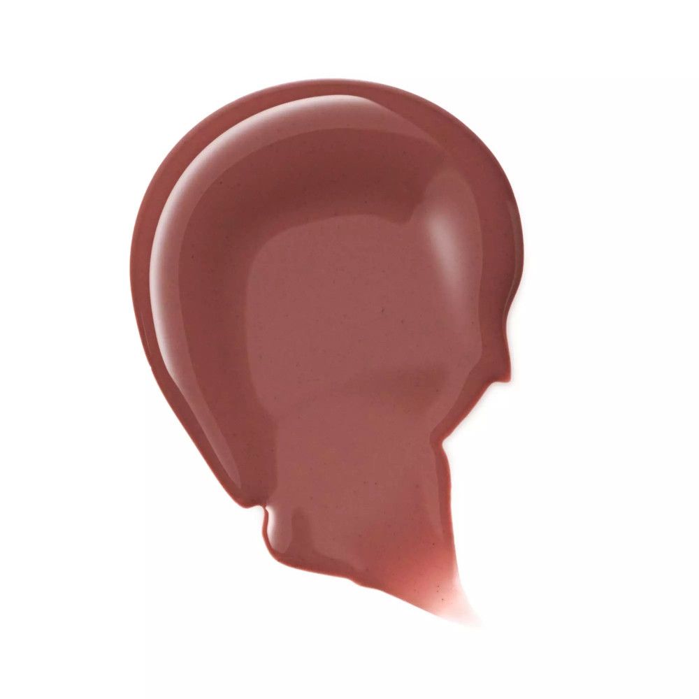 Klieder van lipgloss. Roze tint. Glanzende textuur. Op witte achtergrond.