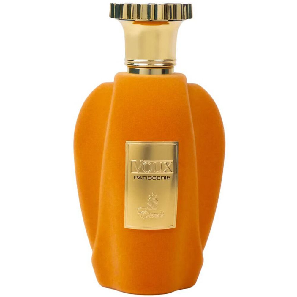 Flacon orange avec détails dorés. Inscriptions dorées: Voux Patisserie. Flacon avec bouchon doré.