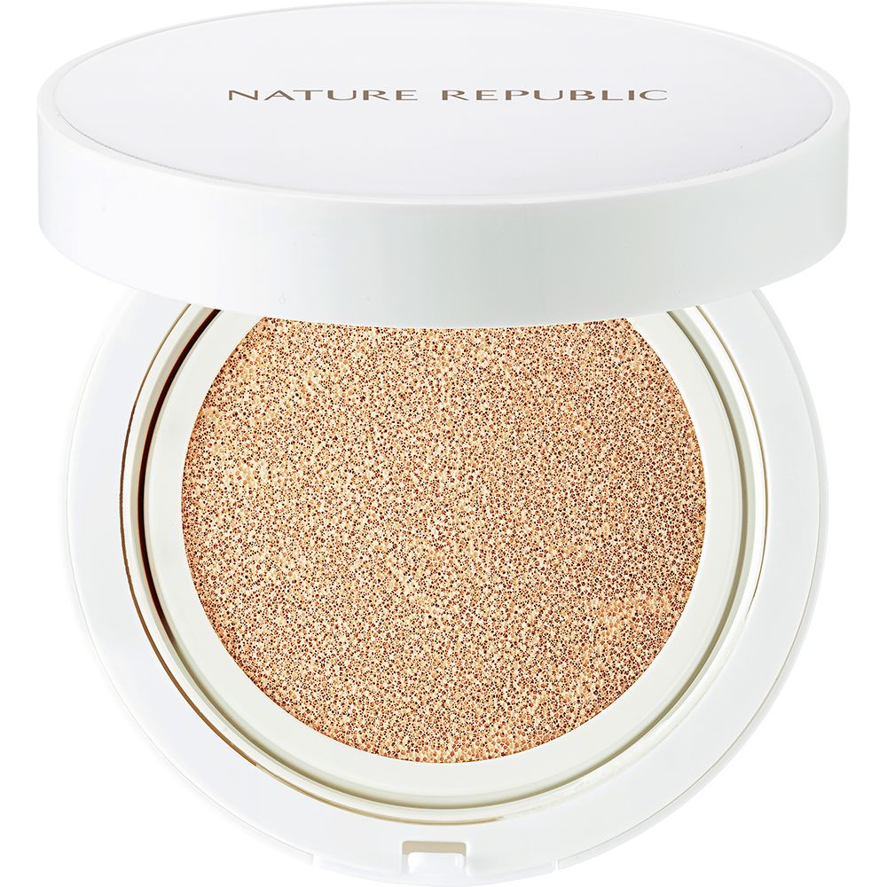 Witte, ronde verpakking met product. Deksel is open en toont de make-up.