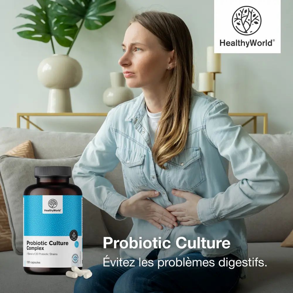 Femme avec maux de ventre. Flacon Probiotic Culture Complex. Texte : Évitez les problèmes digestifs.