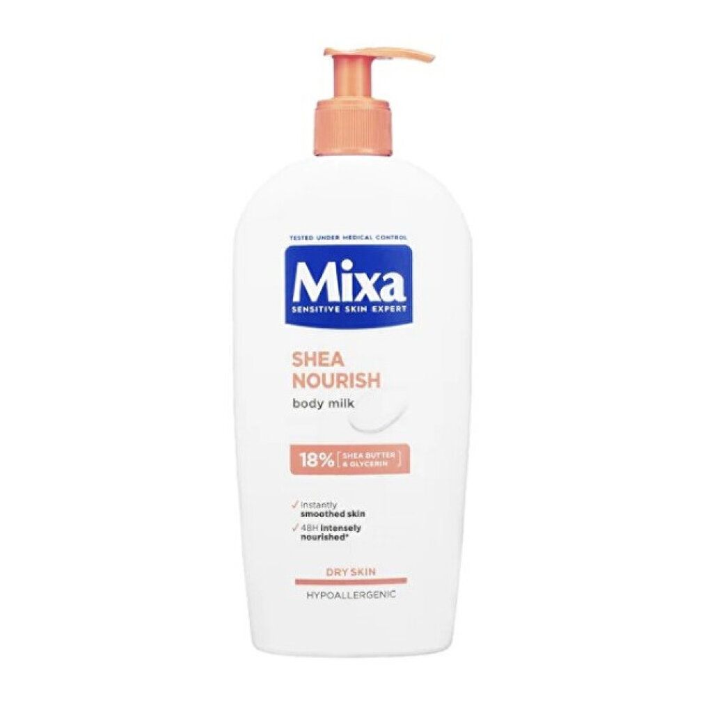 Witte fles met oranje pomp. Opschrift: Mixa, Shea Nourish, Body Milk, 18% shea butter.