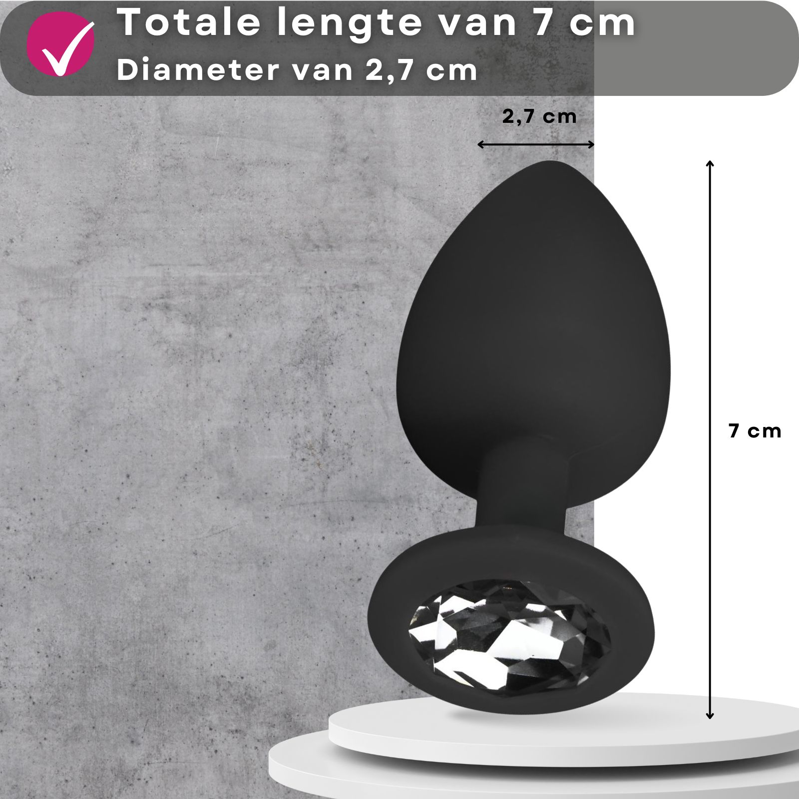 Zwarte anale plug met steen. Afmetingen: 7 cm lang, 2,7 cm diameter.