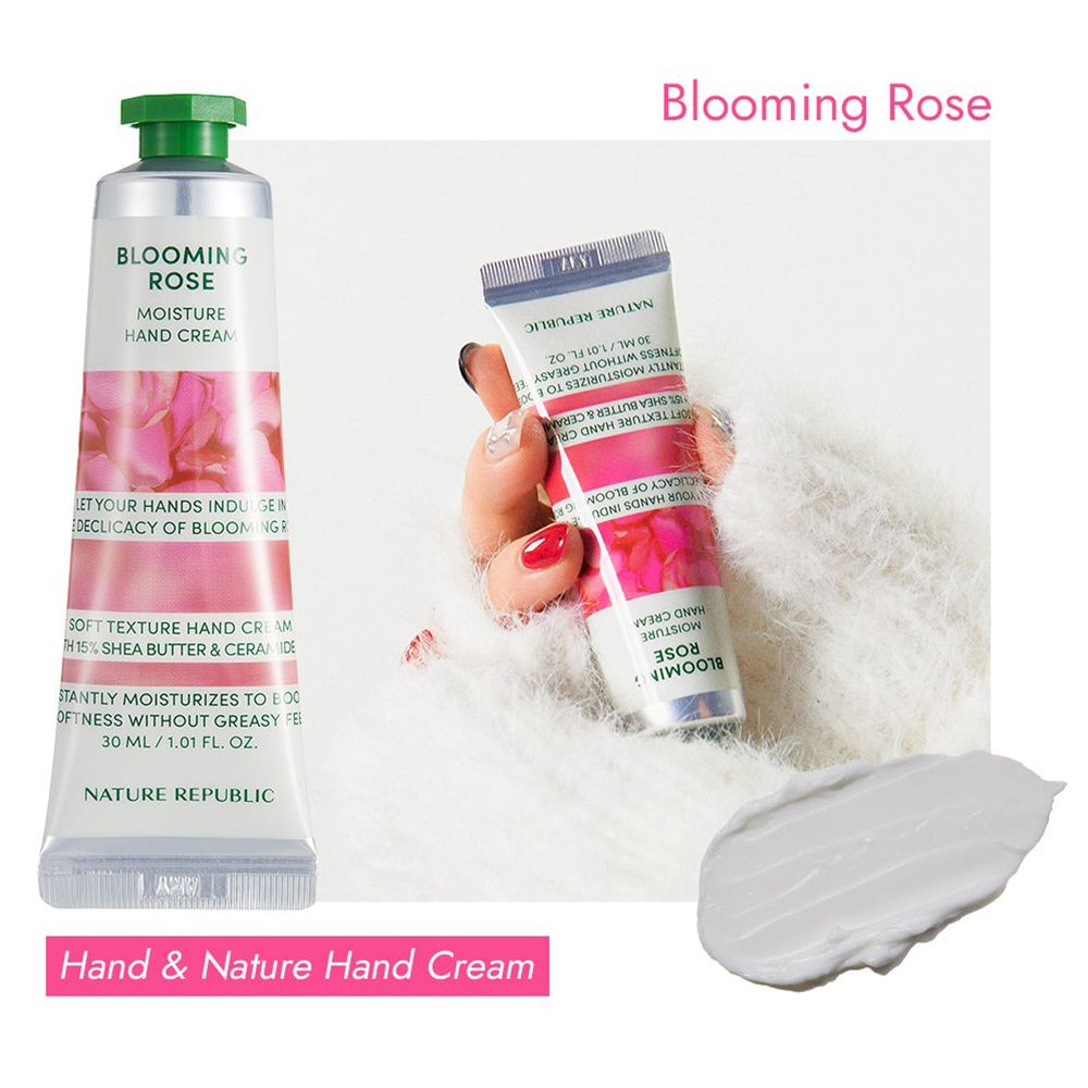 Tube de crème pour les mains Blooming Rose, design blanc et rose, bouchon vert. Texte: Hand & Nature. Crème sur fond blanc et dans une main.