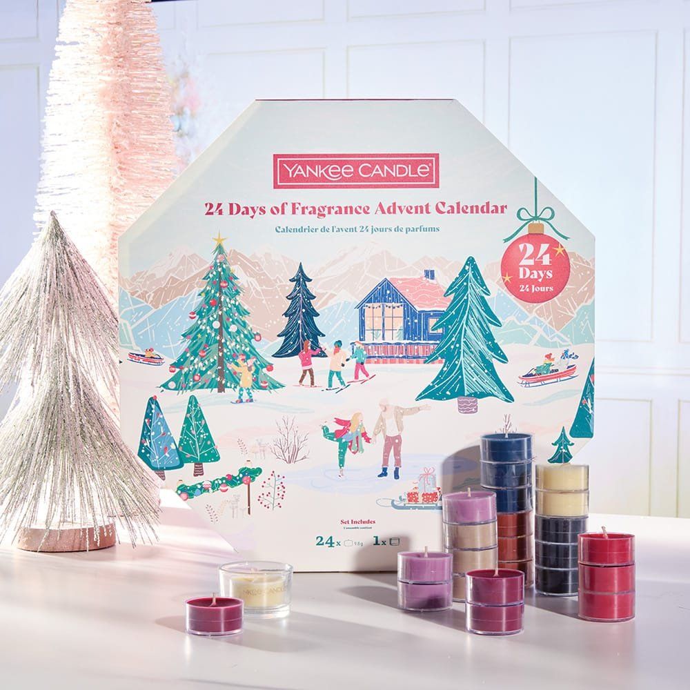 Yankee Candle adventskalender met 24 kaarsen. Meerkleurige theelichtjes. Verpakking met winterlandschap.
