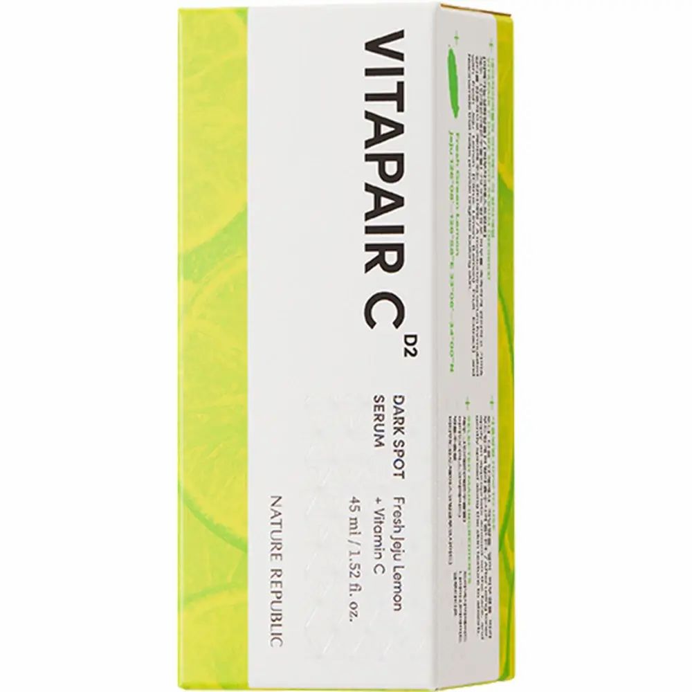 Witte doos met gele en groene accenten. Opschrift: VITAPAIR C, Dark Spot Serum, NATURE REPUBLIC.