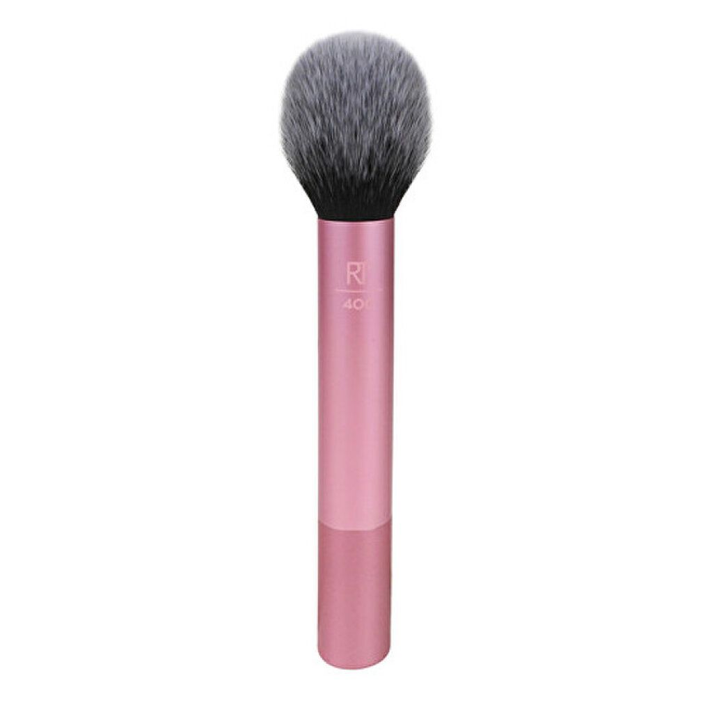 Pinceau à poudre avec manche rose et poils gris-noirs. "R 40" imprimé sur le manche.