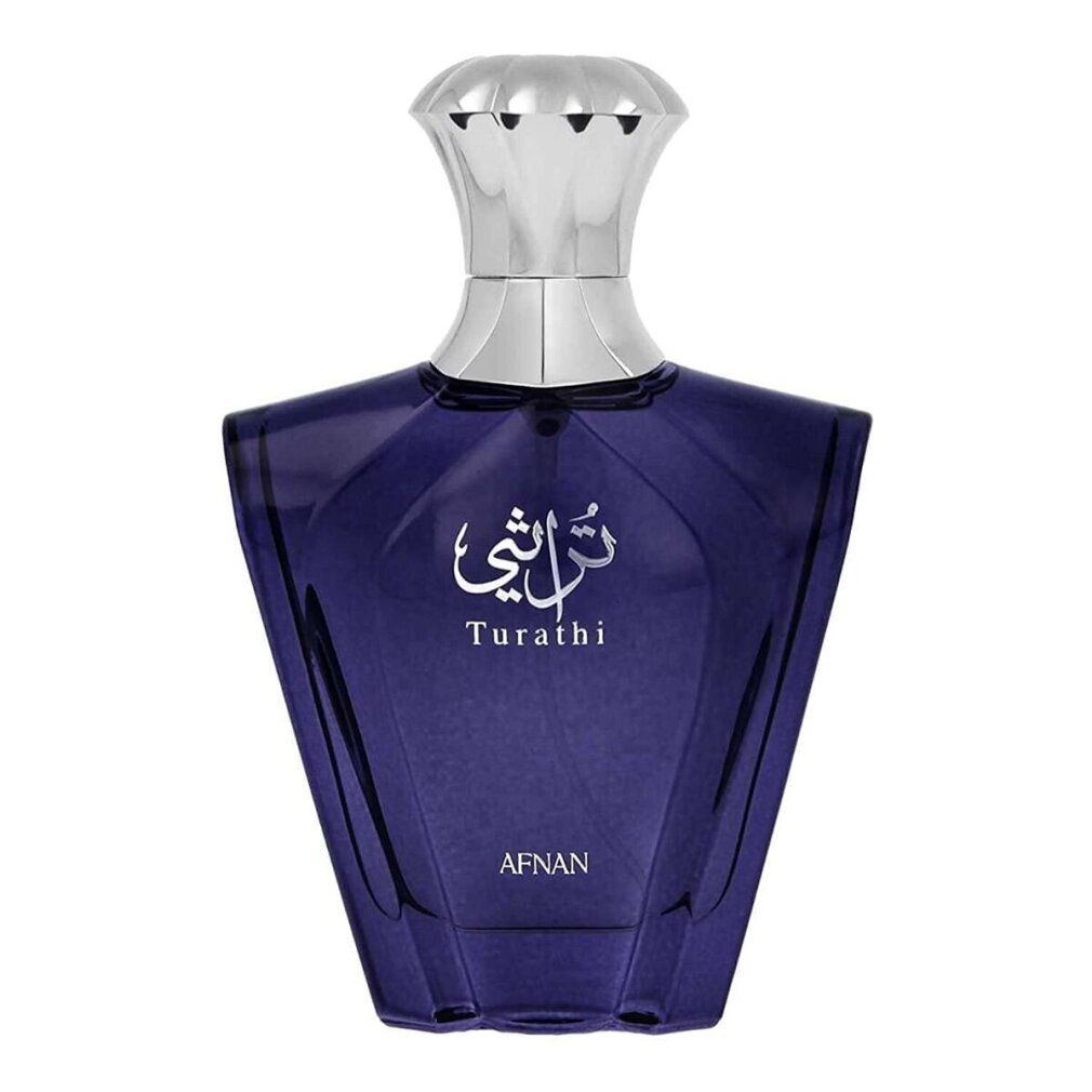 Flacon de parfum bleu avec bouchon argenté. Inscription "Turathi" et "AFNAN". Le flacon a une forme inhabituelle.