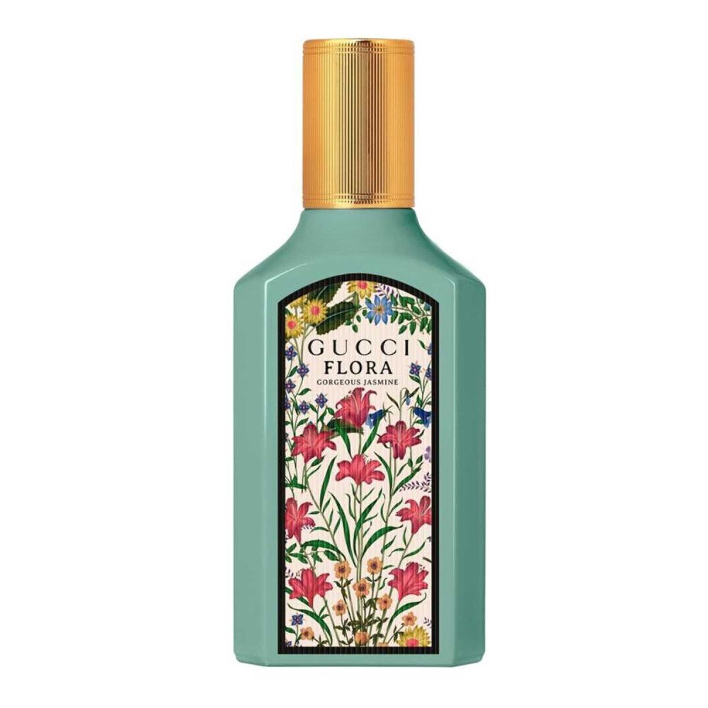 Flacon turquoise avec bouchon doré. Étiquette avec motif floral et nom du produit.