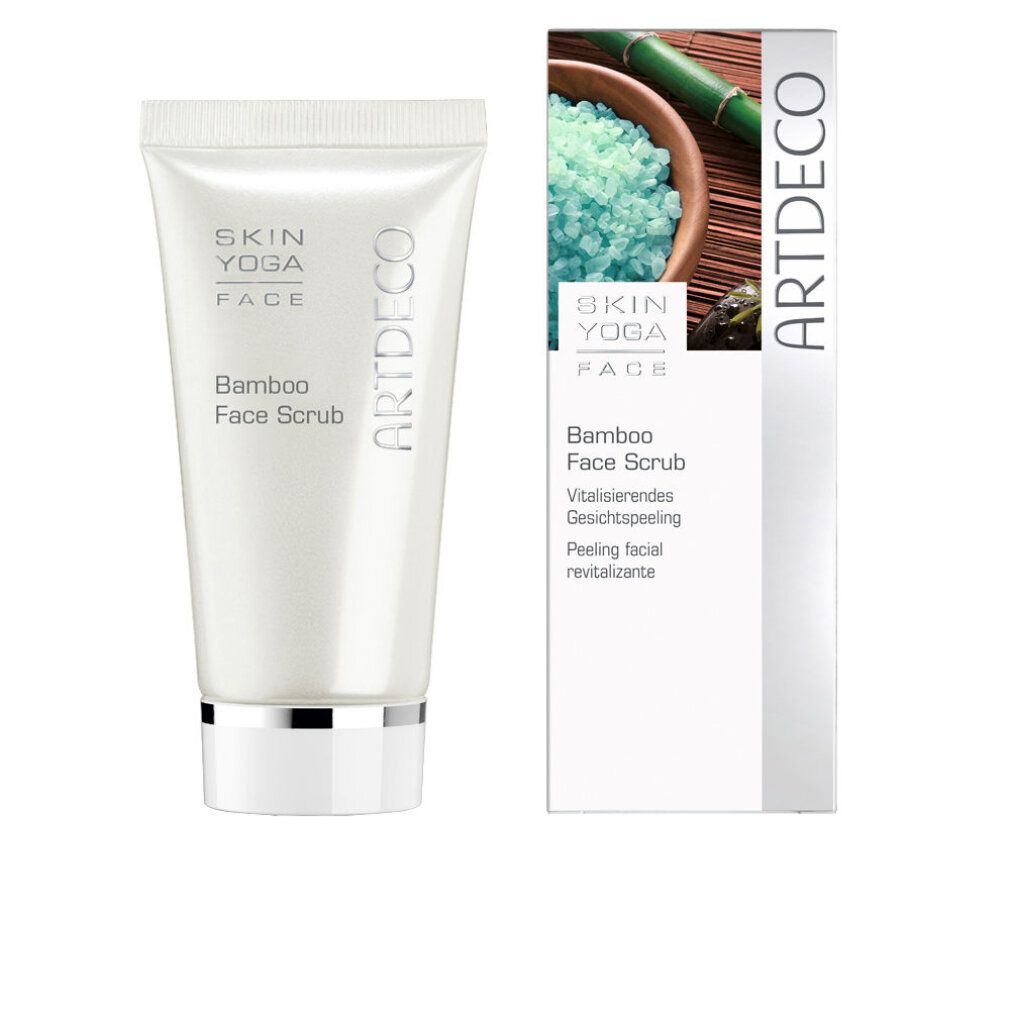 Tube met Skin Yoga Face Bamboo Face Scrub en verpakking. Verpakking met productafbeelding en tekst. Artdeco-logo.