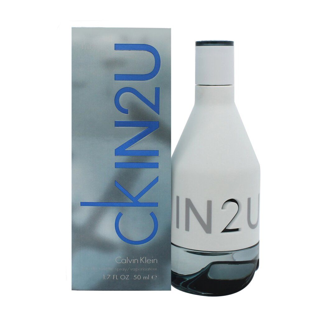 Flacon blanc avec inscription IN2U et emballage avec texte CKIN2U. Logo Calvin Klein et indication de volume.