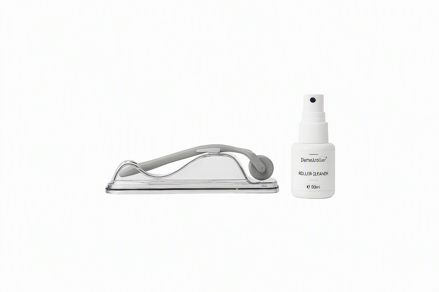 Dermaroller avec support et spray nettoyant.