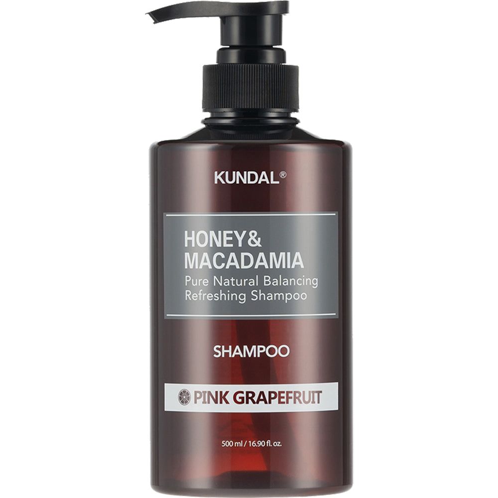 Bruine shampoofles met pompdos en 'Pink Grapefruit' etiket.
