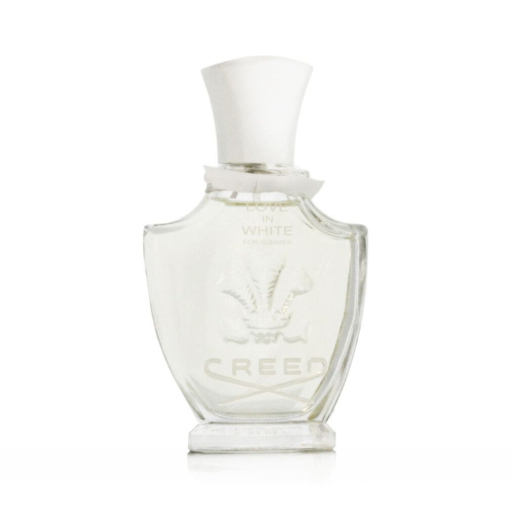 Glazen fles met witte dop. Opschrift: IN WHITE, CREED.