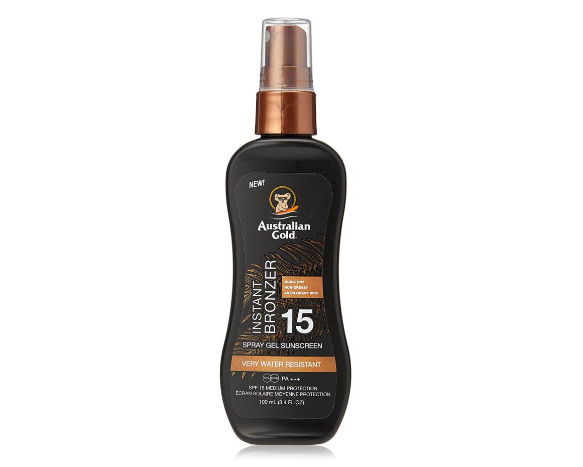 Flacon noir de spray solaire. Inscriptions: Australian Gold, Instant Bronzer, SPF 15, très résistant à l'eau. Avec pulvérisateur.