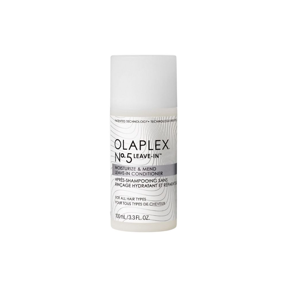 Witte fles Olaplex No.5 Leave-In Conditioner. Tekst: Moisturize & Mend, Après-shampooing sans rinçage. Voor alle haartypes.