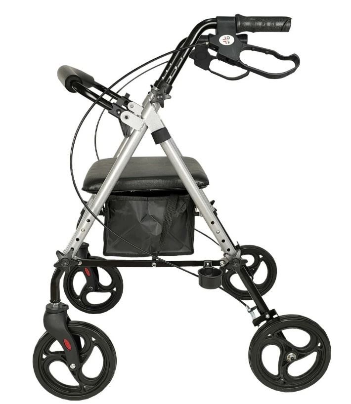 Rollator, zijaanzicht. Aluminium frame, zwarte zitting, mand en 4 wielen. Met handremmen.