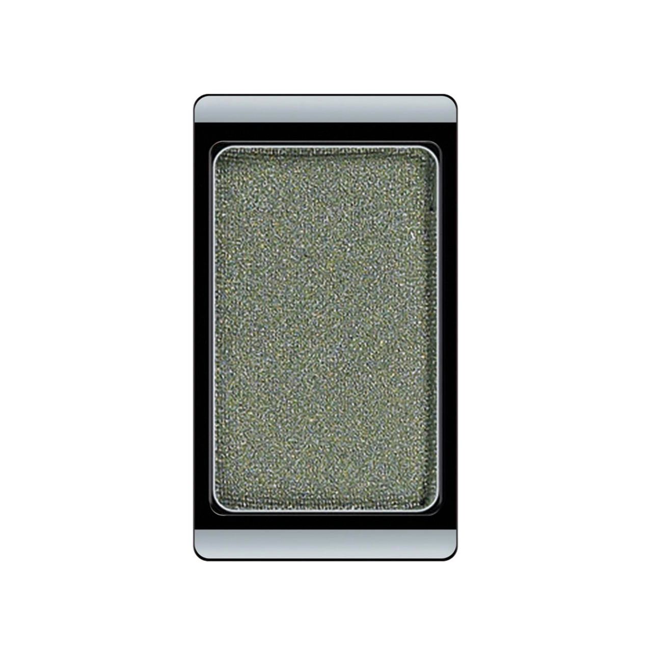 Fard à paupières rectangulaire. Teinte vert-gris avec surface scintillante. Cadre noir, bord argenté.