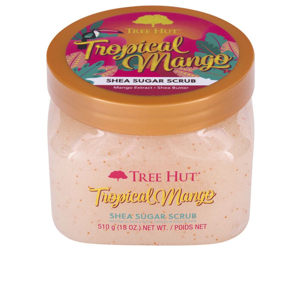 Gommage au sucre et au karité Tree Hut Tropical Mango dans un pot transparent avec un couvercle orange.