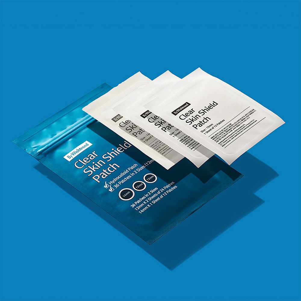 Plusieurs paquets de Clear Skin Shield Patch. Emballages bleus et blancs. Inscription : By Wishtrend, Clear Skin Shield Patch, Hydrocolloid Patch.