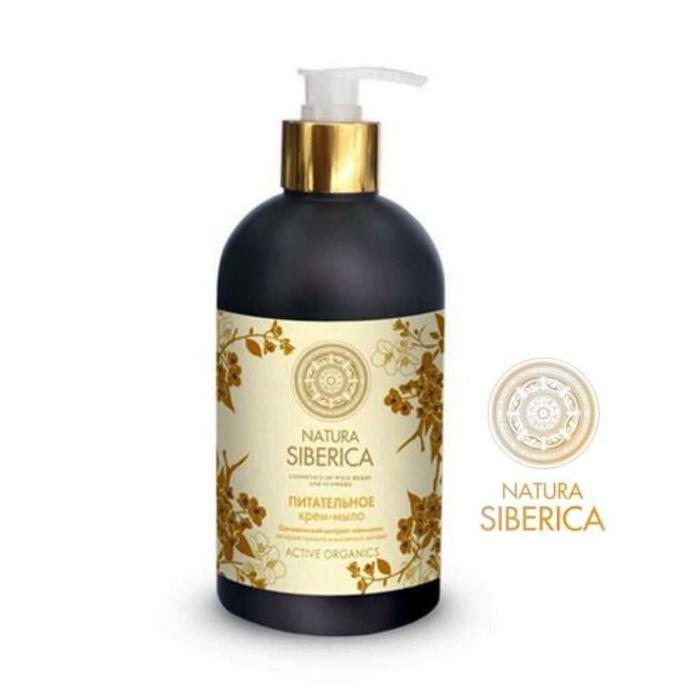 Donkere fles met gouden pomp. Etiket met bloemmotief en tekst. Logo: Natura Siberica.