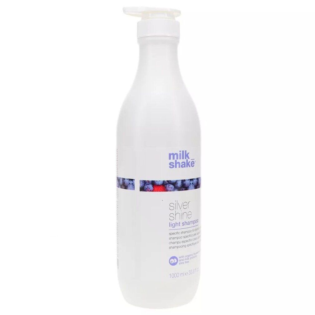 Flacon de shampooing blanc avec pompe. Inscription: milk_shake, Silver Shine light shampoo. 1000 ml.