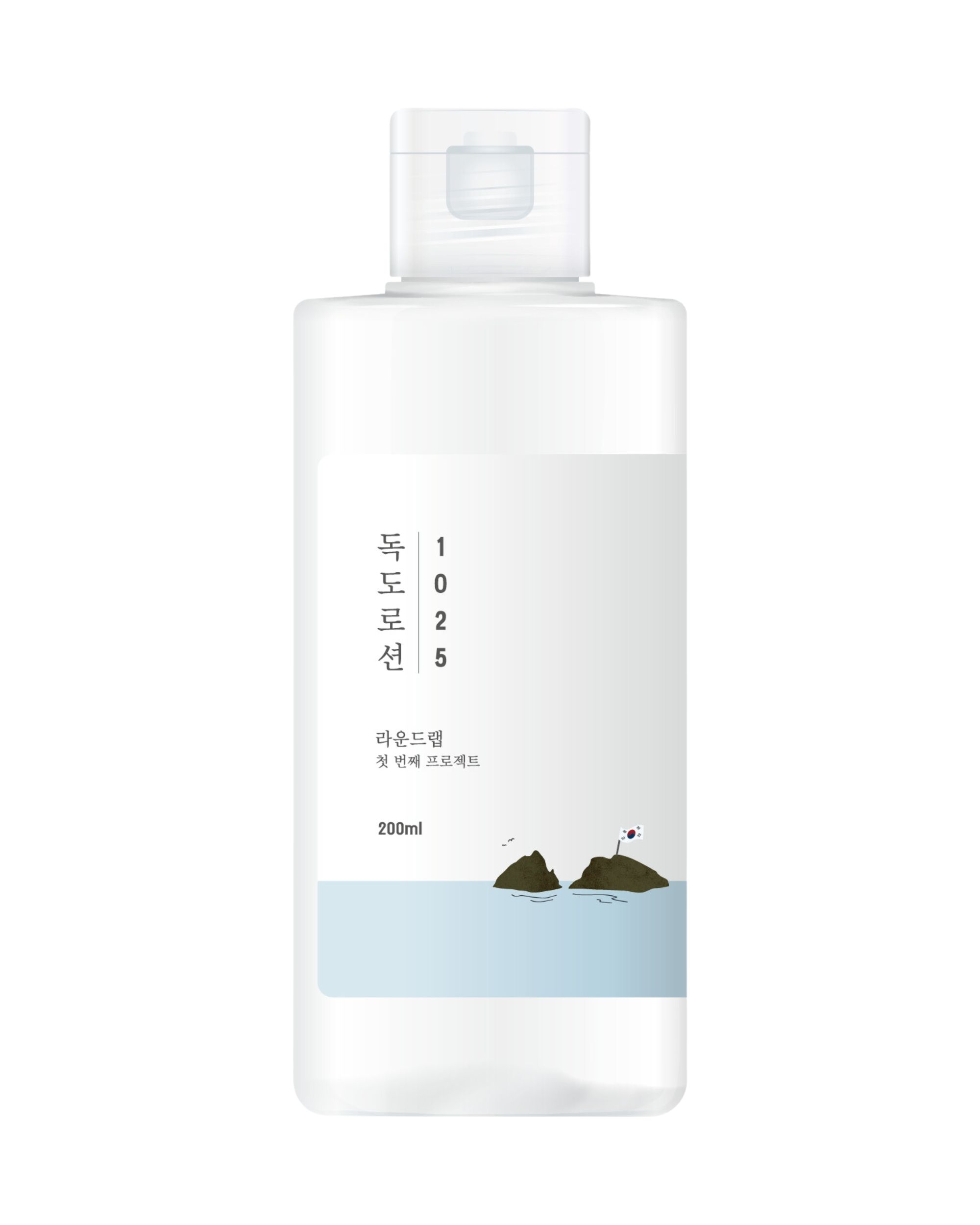Flacon de lotion blanc avec bouchon rabattable. Étiquette avec texte coréen et illustration. 200ml.