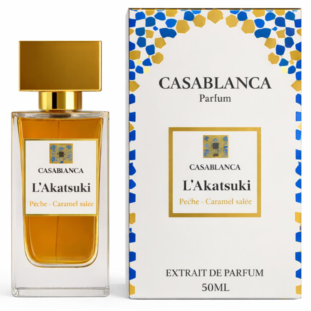 Flacon de parfum et emballage. Flacon avec bouchon doré. Emballage avec nom du produit et logo.