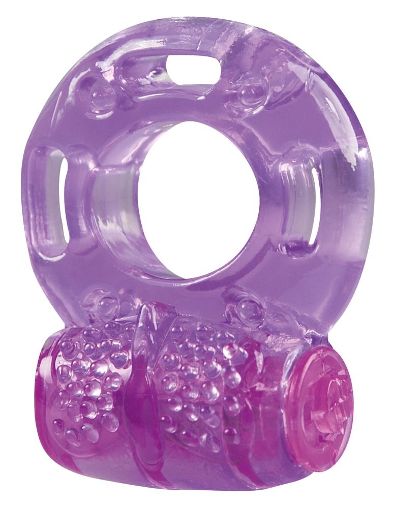 Anneau pénien violet avec module vibrant et picots. Forme annulaire avec ouvertures. En matériau transparent.