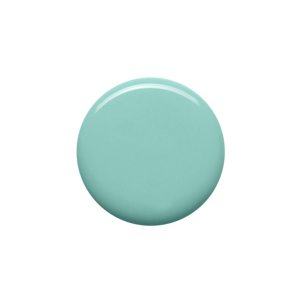 Tache de vernis à ongles turquoise sur fond blanc. Forme ronde, surface brillante.