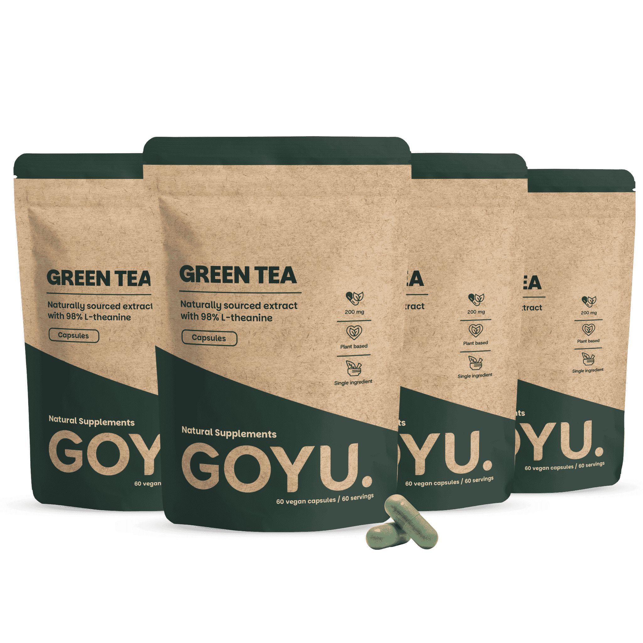 Vier verpakkingen groene thee extract capsules, één open, met twee capsules ernaast.