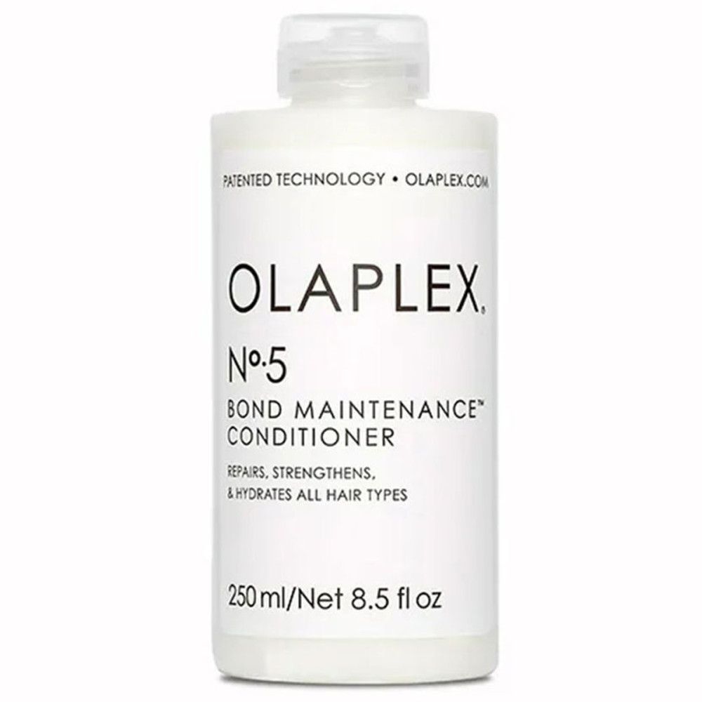 Flacon blanc Olaplex Nº5 Bond Maintenance Conditioner. Contient 250 ml/8,5 fl oz. Répare, renforce et hydrate tous types de cheveux.