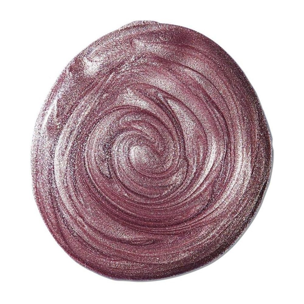 Cirkelvormige swatch van een vloeibare highlighter. Tint: glanzend roze-paars. Textuur: gewirveld.