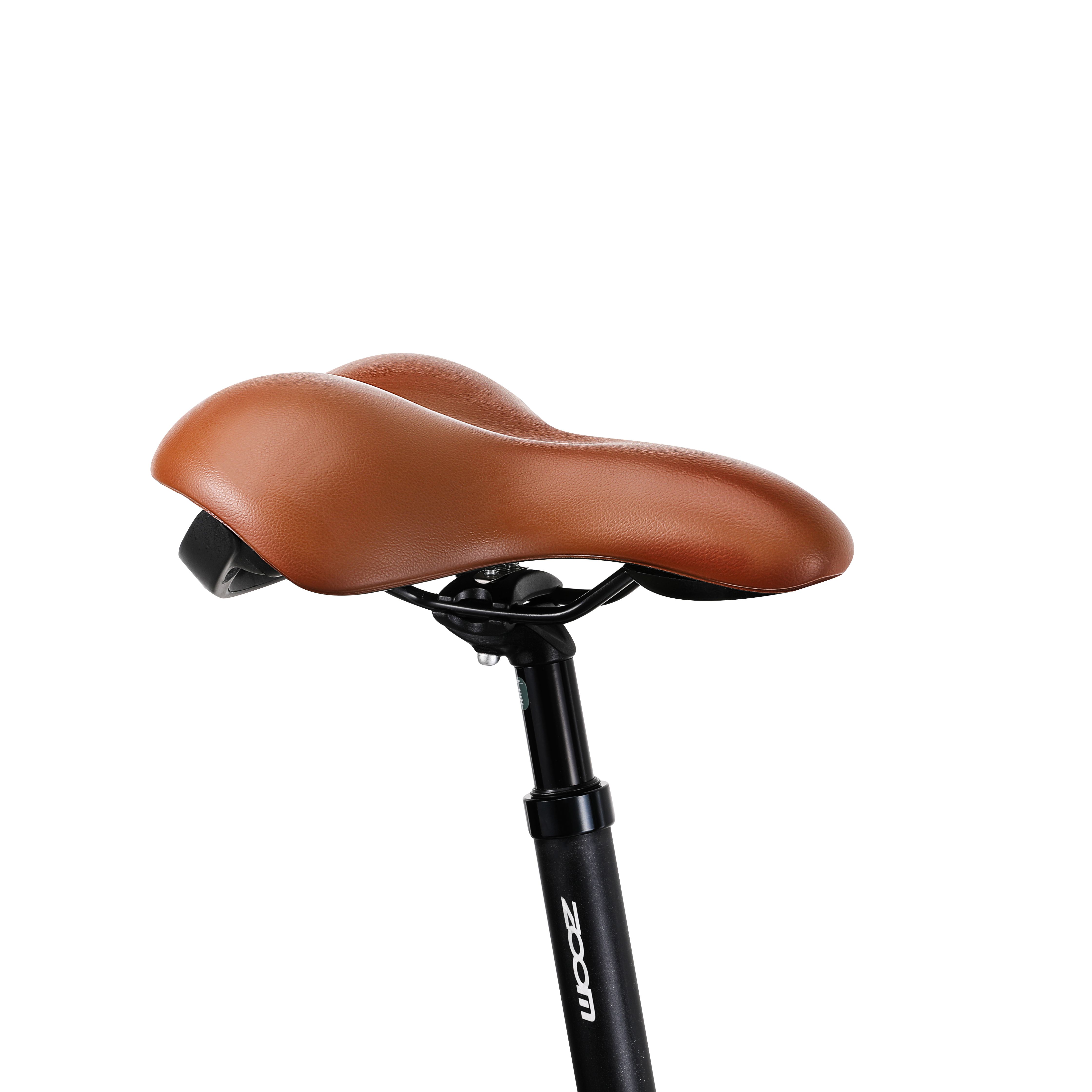Selle de vélo marron sur tige de selle noire. Marque Zoom visible.
