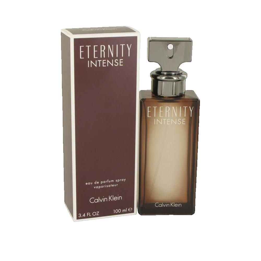 Flacon de parfum et emballage. Inscription : ETERNITY INTENSE, Calvin Klein. Dégradés de marron. 100 ml.