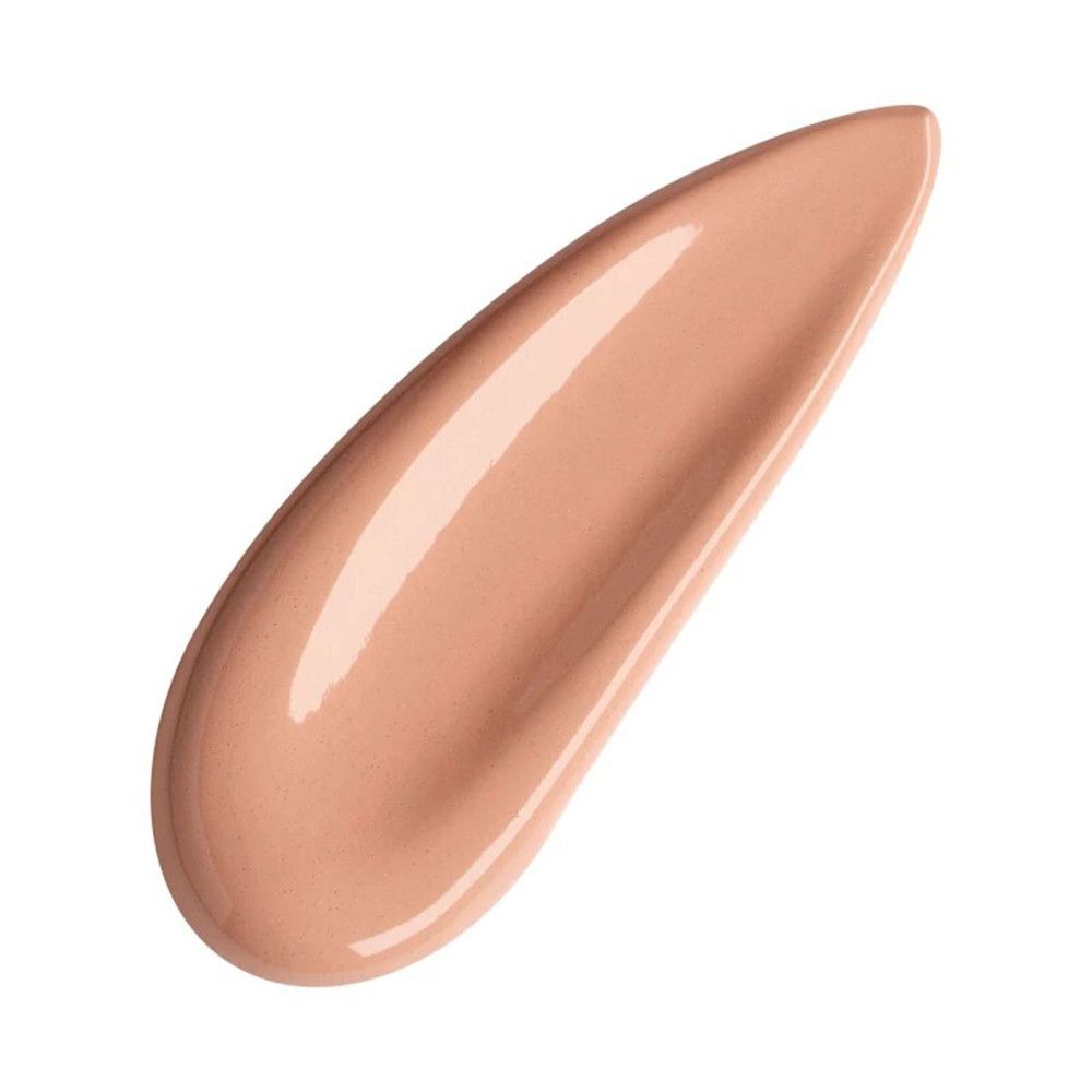 Une touche de fond de teint neutre couleur peau.