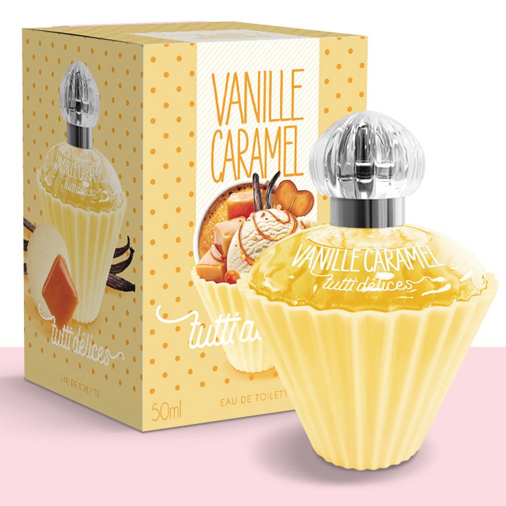 Geel parfumflesje in cupcake-vorm met dop. Opschrift: Vanille Caramel, Tutti Délices. Doos met cupcake-motief erachter.