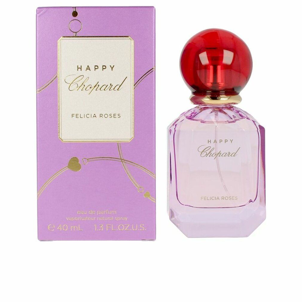 Flacon de parfum et emballage. Flacon rose, bouchon rouge. Emballage lilas avec texte doré. Inscription: Happy Chopard Felicia Roses.