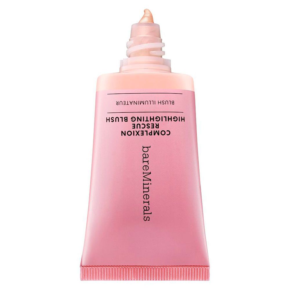 Tube rose avec produit. Inscription: COMPLEXION RESCUE HIGHLIGHTING BLUSH, bareMinerals. Embout avec produit.