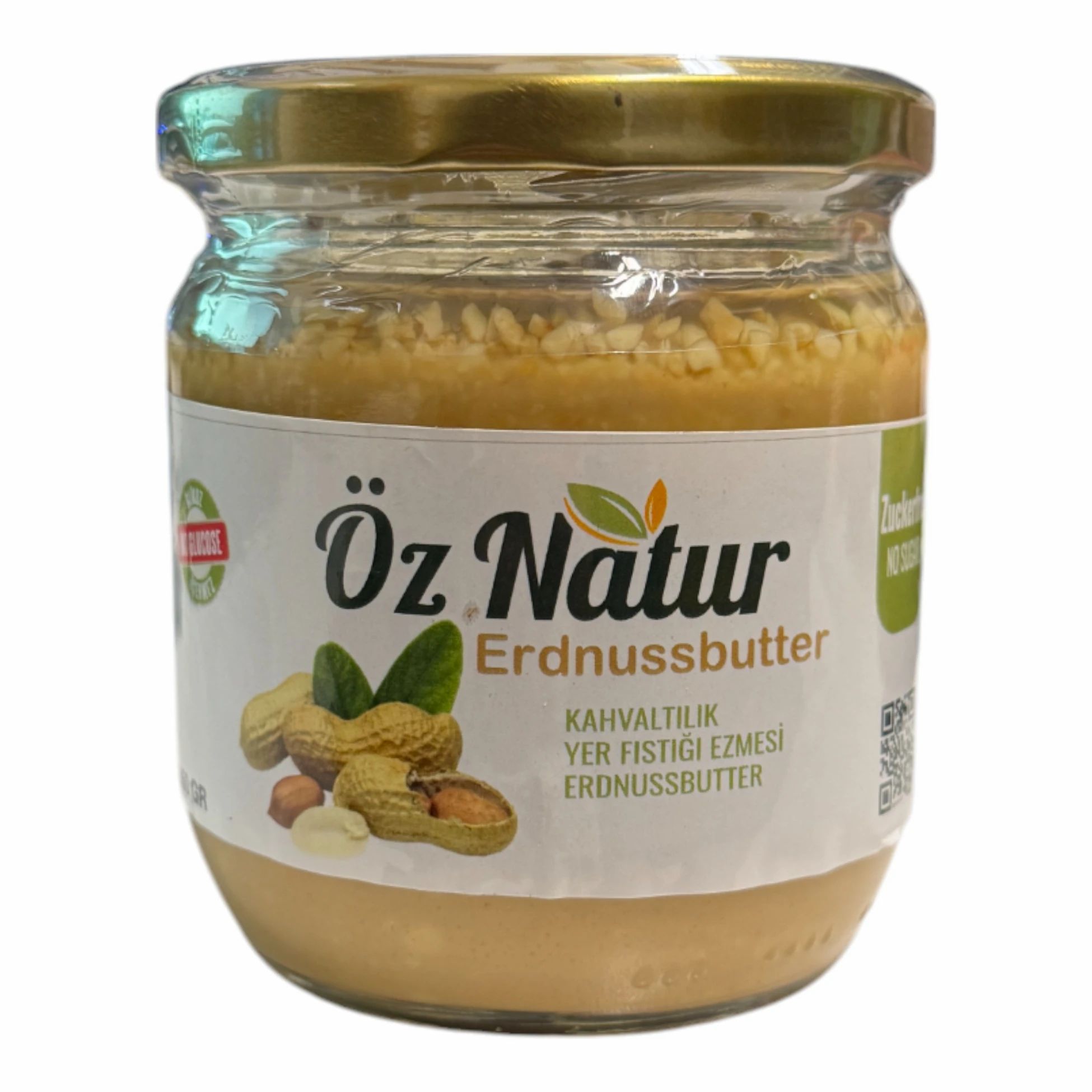 Pot de beurre de cacahuète. Inscription : Öz Natur Erdnussbutter. Illustration de cacahuètes. Étiquette avec texte turc.
