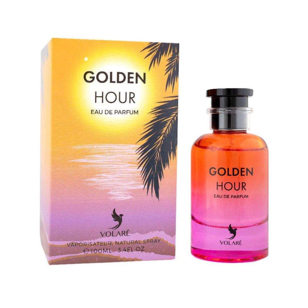 Flacon de parfum et boîte. Flacon dégradé, bouchon noir. Boîte avec design coucher de soleil et nom du produit.