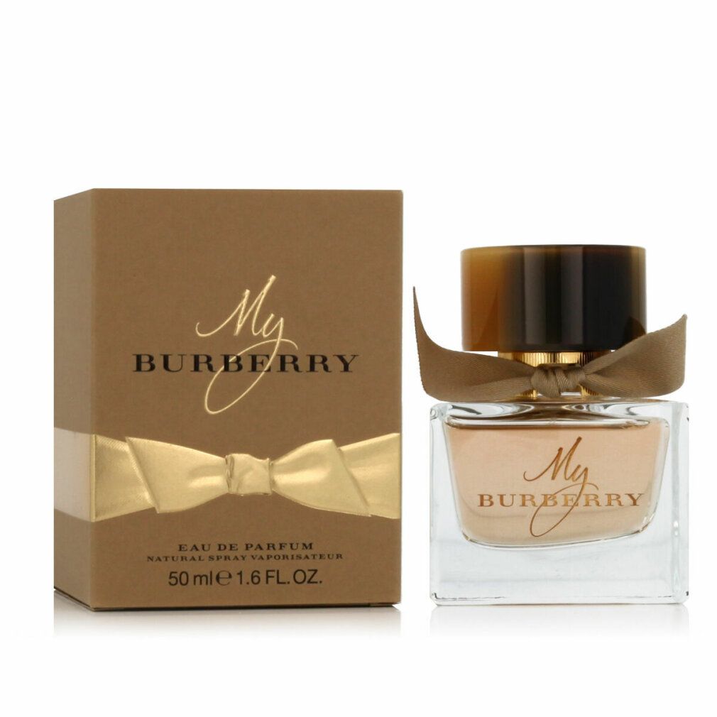 Parfumfles en doos. Fles met gouden dop en strik. Op de doos staat My Burberry.