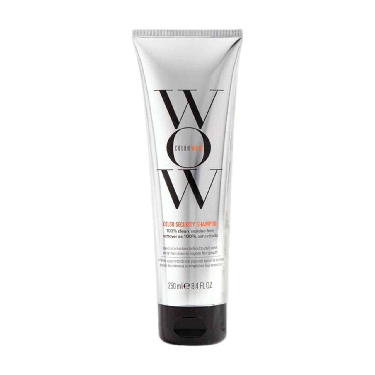 Zilveren tube met zwarte dop. Opschrift "WOW" en "COLOR WOW". Productnaam "Color Security Shampoo".