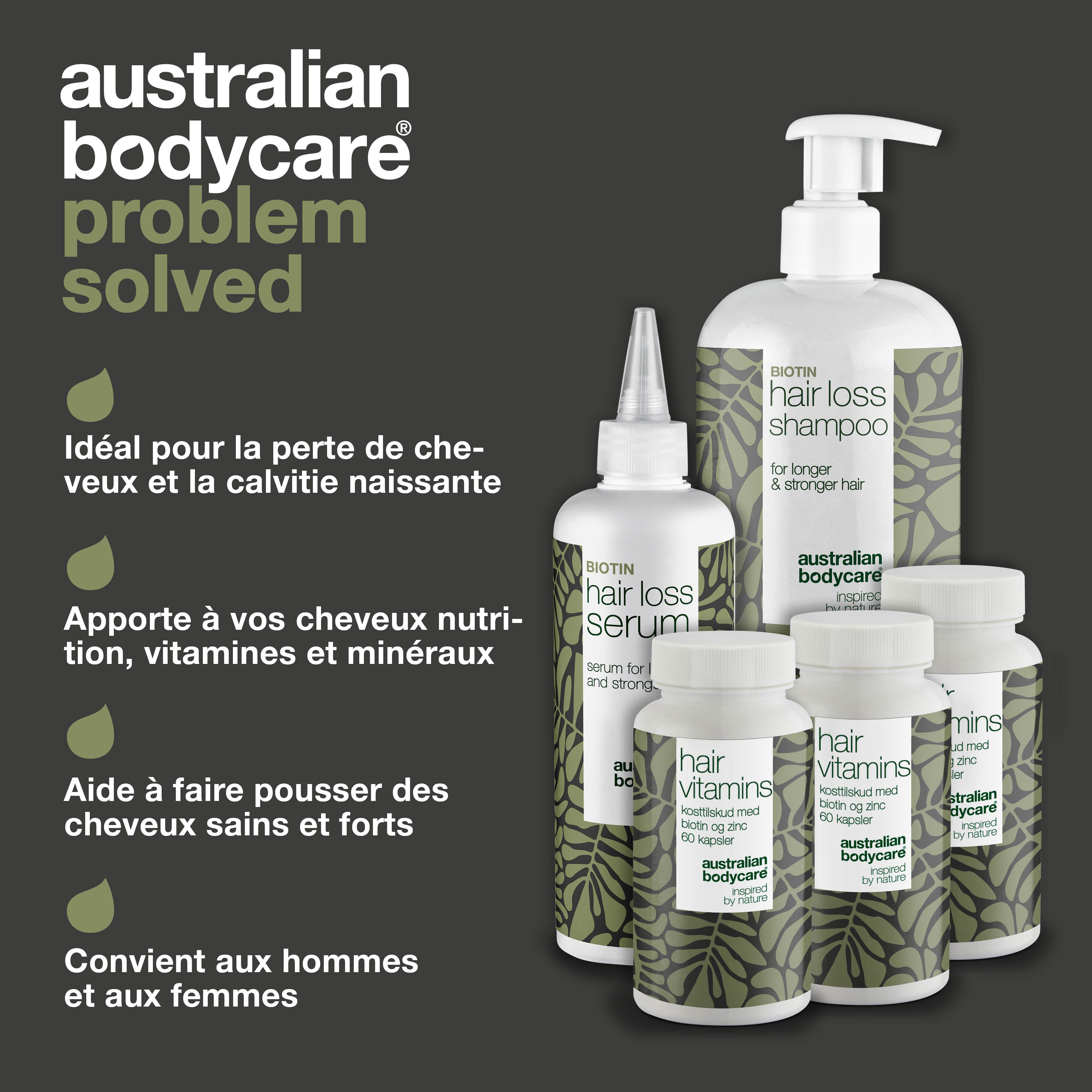 Attache de cheveux et produits. Inscription : Hair Loss Shampoo, Hair Loss Serum, Hair Vitamins. Marque : Australian Bodycare.