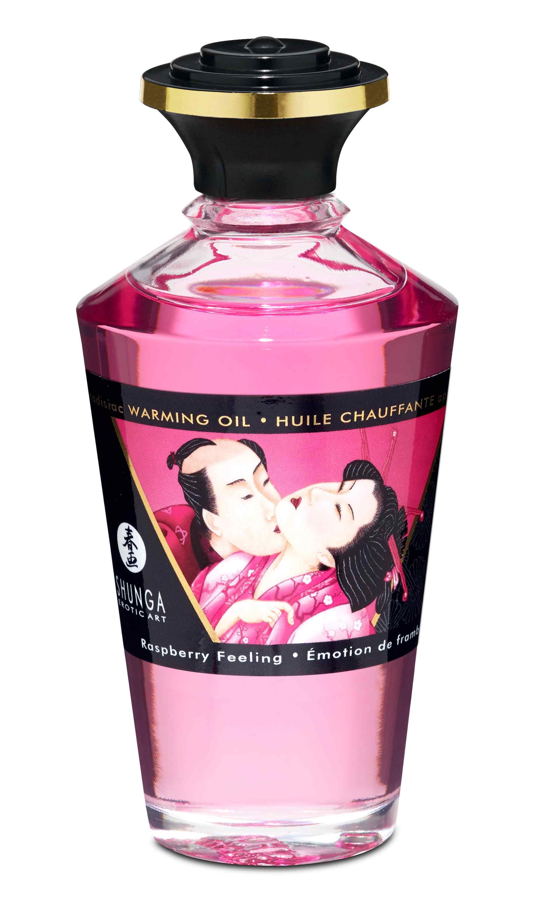Huile chauffante Shunga Raspberry Feeling en flacon rose.