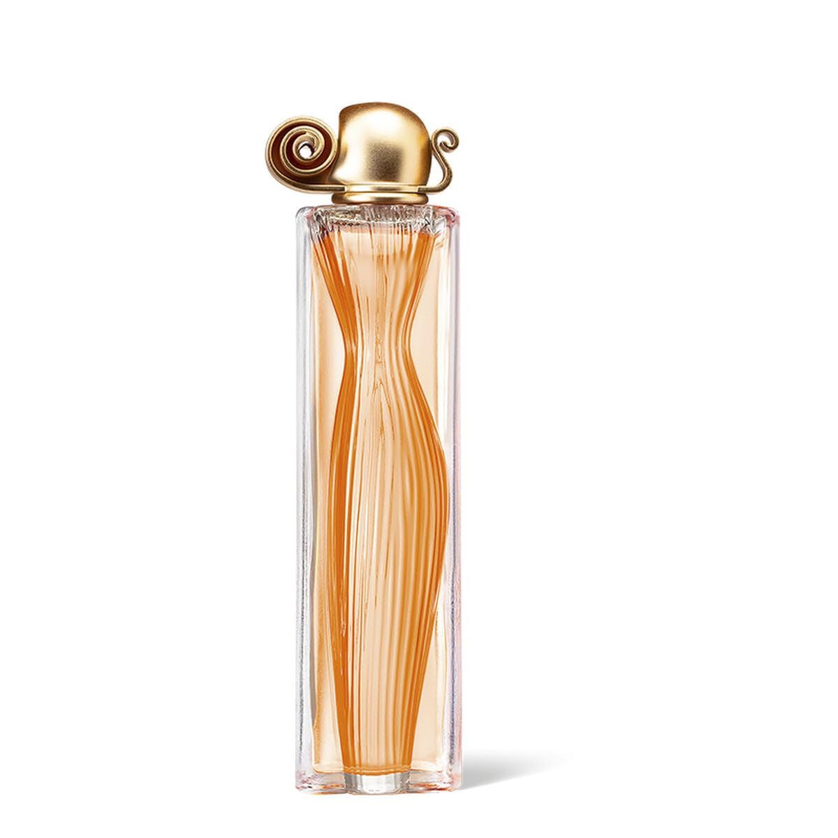 Organza Eau de Parfum fles. Goudkleurige fles met gouden dop. Fles in de vorm van een jurk.
