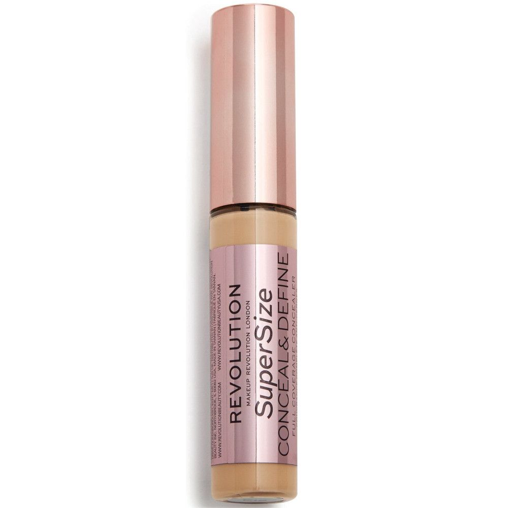 Flacon d'anticernes avec bouchon or rose. Nom du produit et marque visibles.