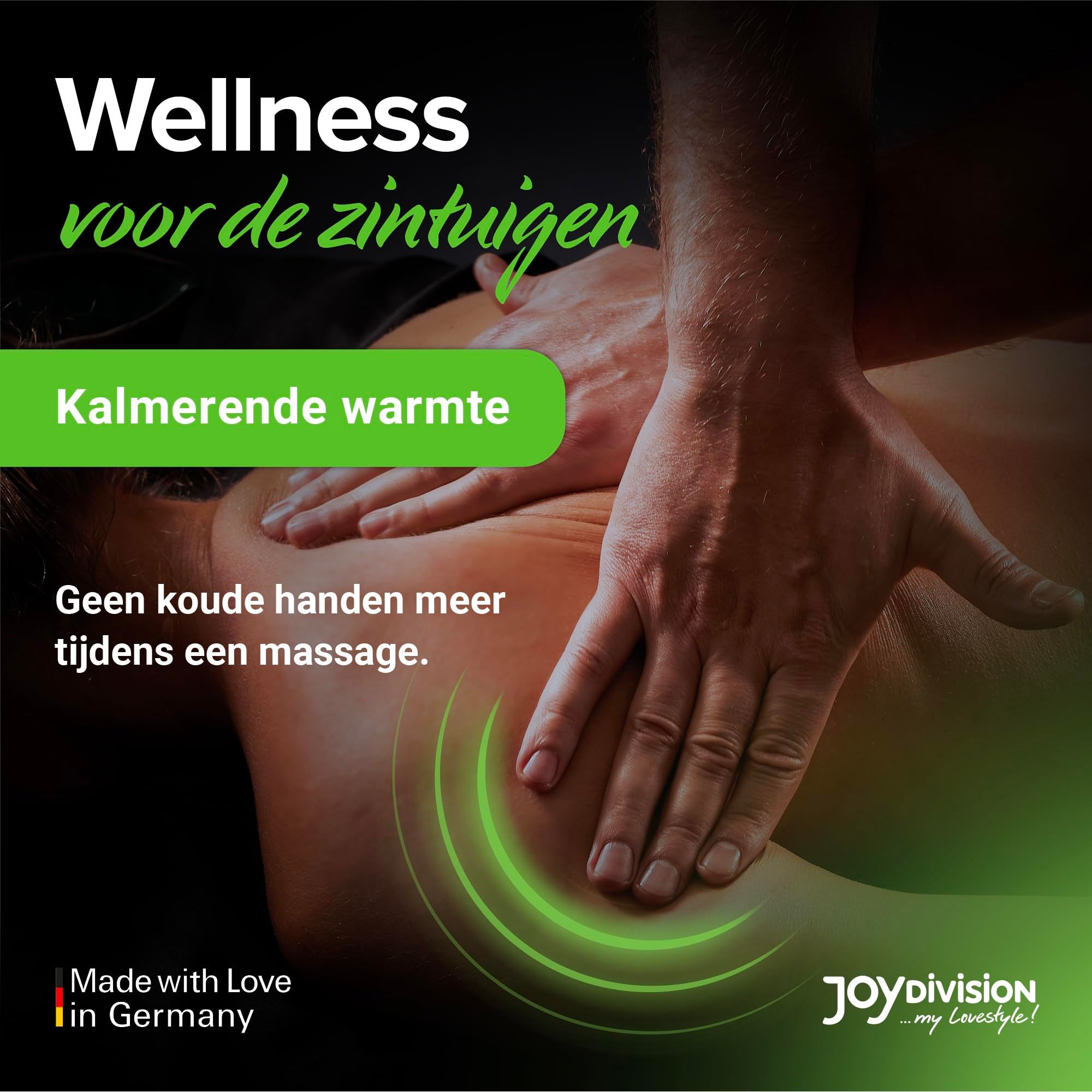 Fles WARMUP® Groene Appel Massage-Liquid met zwarte dop, appel-etiket en spatten.