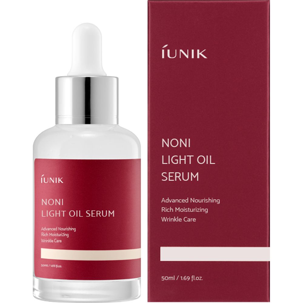 Glazen fles en doos. Opschrift: iUNIK Noni Light Oil Serum. Rood etiket en doos.
